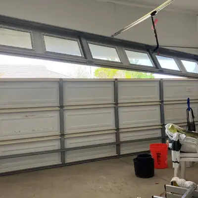 Double garage door with window row, inside view