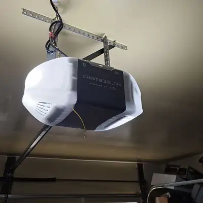 Ceiling-mounted garage door opener