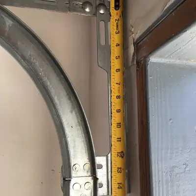 Measuring headroom at the door track and jamb